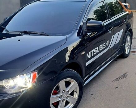 Чорний Міцубісі Lancer, об'ємом двигуна 2 л та пробігом 170 тис. км за 6800 $, фото 7 на Automoto.ua