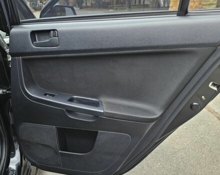 Черный Мицубиси Лансер, объемом двигателя 2 л и пробегом 115 тыс. км за 5000 $, фото 13 на Automoto.ua