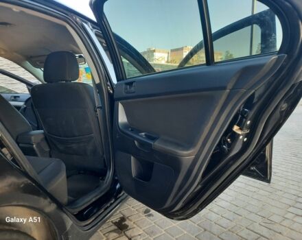 Чорний Міцубісі Lancer, об'ємом двигуна 1.5 л та пробігом 283 тис. км за 4500 $, фото 10 на Automoto.ua