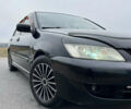 Чорний Міцубісі Lancer, об'ємом двигуна 1.6 л та пробігом 212 тис. км за 4700 $, фото 2 на Automoto.ua