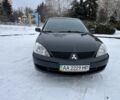Чорний Міцубісі Lancer, об'ємом двигуна 1.6 л та пробігом 260 тис. км за 3999 $, фото 2 на Automoto.ua