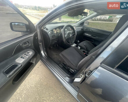 Чорний Міцубісі Lancer, об'ємом двигуна 1.6 л та пробігом 162 тис. км за 4650 $, фото 9 на Automoto.ua