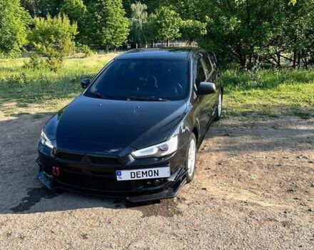 Чорний Міцубісі Lancer, об'ємом двигуна 2 л та пробігом 226 тис. км за 7200 $, фото 10 на Automoto.ua