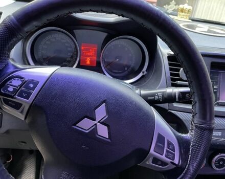 Чорний Міцубісі Lancer, об'ємом двигуна 2 л та пробігом 175 тис. км за 6500 $, фото 12 на Automoto.ua