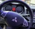 Чорний Міцубісі Lancer, об'ємом двигуна 2 л та пробігом 175 тис. км за 6500 $, фото 12 на Automoto.ua