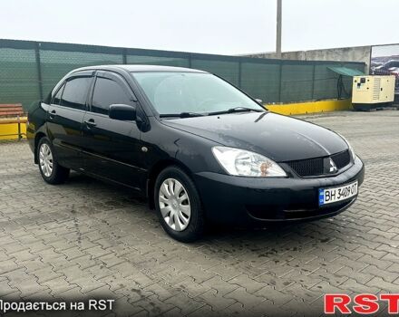 Чорний Міцубісі Lancer, об'ємом двигуна 1.6 л та пробігом 248 тис. км за 3950 $, фото 1 на Automoto.ua
