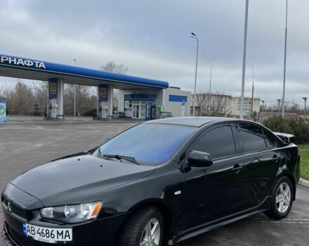 Черный Мицубиси Лансер, объемом двигателя 2 л и пробегом 350 тыс. км за 6700 $, фото 2 на Automoto.ua