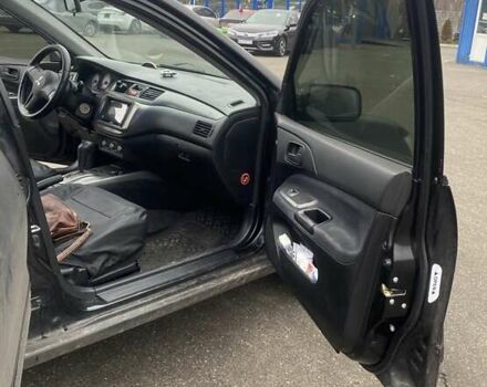 Черный Мицубиси Лансер, объемом двигателя 1.58 л и пробегом 263 тыс. км за 4000 $, фото 34 на Automoto.ua