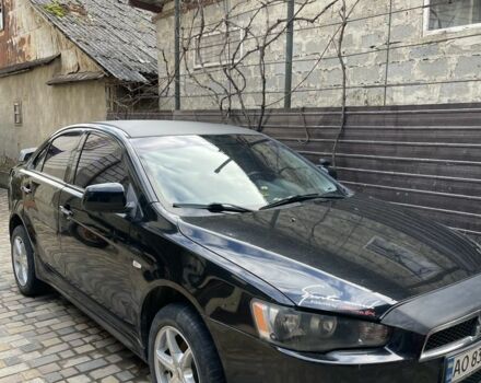 Чорний Міцубісі Lancer, об'ємом двигуна 2 л та пробігом 175 тис. км за 6500 $, фото 4 на Automoto.ua