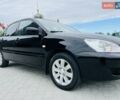 Чорний Міцубісі Lancer, об'ємом двигуна 1.6 л та пробігом 243 тис. км за 4950 $, фото 15 на Automoto.ua