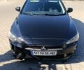 Чорний Міцубісі Lancer, об'ємом двигуна 2 л та пробігом 141 тис. км за 6300 $, фото 1 на Automoto.ua