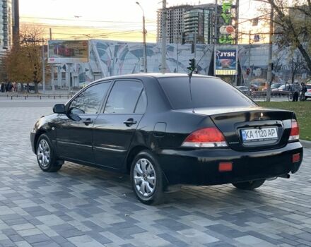 Черный Мицубиси Лансер, объемом двигателя 1.6 л и пробегом 237 тыс. км за 4300 $, фото 5 на Automoto.ua