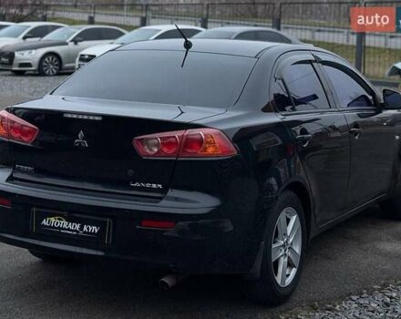 Черный Мицубиси Лансер, объемом двигателя 1.5 л и пробегом 245 тыс. км за 4499 $, фото 3 на Automoto.ua