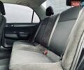 Черный Мицубиси Лансер, объемом двигателя 1.58 л и пробегом 243 тыс. км за 4950 $, фото 39 на Automoto.ua