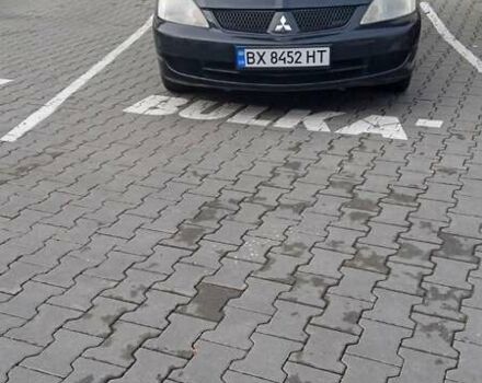 Черный Мицубиси Лансер, объемом двигателя 1.6 л и пробегом 223 тыс. км за 4300 $, фото 7 на Automoto.ua