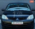 Чорний Міцубісі Lancer, об'ємом двигуна 1.6 л та пробігом 500 тис. км за 3400 $, фото 1 на Automoto.ua