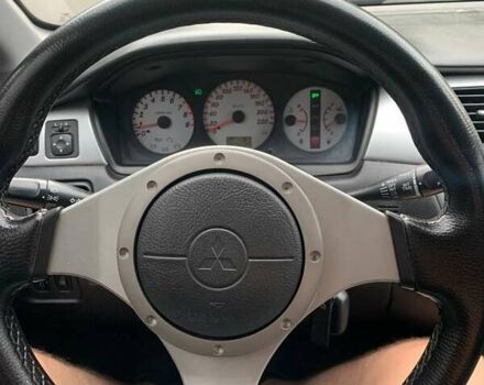 Чорний Міцубісі Lancer, об'ємом двигуна 2 л та пробігом 258 тис. км за 5200 $, фото 6 на Automoto.ua