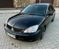 Черный Мицубиси Лансер, объемом двигателя 1.6 л и пробегом 291 тыс. км за 3399 $, фото 1 на Automoto.ua