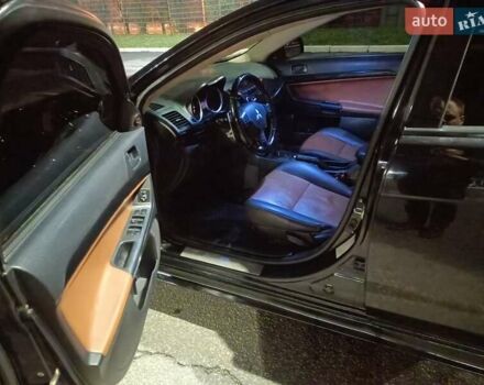 Черный Мицубиси Лансер, объемом двигателя 2 л и пробегом 240 тыс. км за 6400 $, фото 8 на Automoto.ua