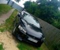 Чорний Міцубісі Lancer, об'ємом двигуна 2 л та пробігом 202 тис. км за 6000 $, фото 1 на Automoto.ua