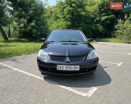 Чорний Міцубісі Lancer, об'ємом двигуна 1.6 л та пробігом 296 тис. км за 4200 $, фото 1 на Automoto.ua
