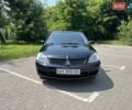 Чорний Міцубісі Lancer, об'ємом двигуна 1.6 л та пробігом 296 тис. км за 4200 $, фото 1 на Automoto.ua