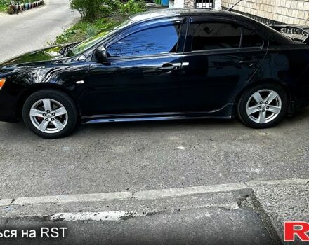 Мицубиси Лансер 2008 в Полтаве на Automoto.ua Черный Мицубиси Лансер, объемом двигателя 2 л и пробегом 284 тыс. км за 6300 $, фото 2 на Automoto.ua
