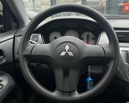 Чорний Міцубісі Lancer, об'ємом двигуна 1.6 л та пробігом 340 тис. км за 6190 $, фото 14 на Automoto.ua