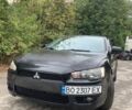 Черный Мицубиси Лансер, объемом двигателя 2 л и пробегом 227 тыс. км за 6000 $, фото 1 на Automoto.ua