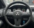 Чорний Міцубісі Lancer, об'ємом двигуна 1.6 л та пробігом 340 тис. км за 6190 $, фото 14 на Automoto.ua