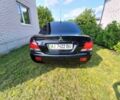 Чорний Міцубісі Lancer, об'ємом двигуна 1.6 л та пробігом 230 тис. км за 4700 $, фото 4 на Automoto.ua