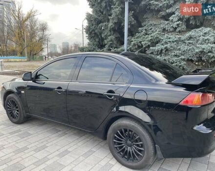 Чорний Міцубісі Lancer, об'ємом двигуна 1.5 л та пробігом 184 тис. км за 6000 $, фото 3 на Automoto.ua