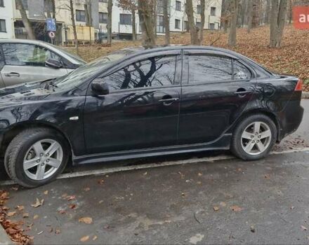 Чорний Міцубісі Lancer, об'ємом двигуна 2 л та пробігом 302 тис. км за 7200 $, фото 3 на Automoto.ua