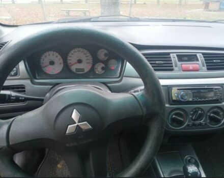 Черный Мицубиси Лансер, объемом двигателя 6 л и пробегом 190 тыс. км за 4500 $, фото 3 на Automoto.ua