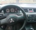 Черный Мицубиси Лансер, объемом двигателя 6 л и пробегом 190 тыс. км за 4500 $, фото 3 на Automoto.ua