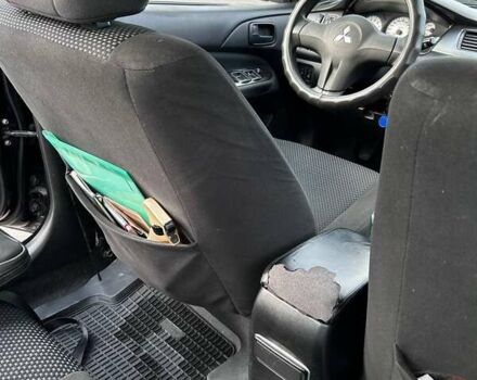 Чорний Міцубісі Lancer, об'ємом двигуна 1.6 л та пробігом 310 тис. км за 3500 $, фото 17 на Automoto.ua