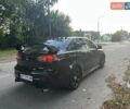 Черный Мицубиси Лансер, объемом двигателя 2 л и пробегом 188 тыс. км за 6900 $, фото 3 на Automoto.ua