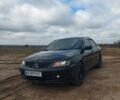 Чорний Міцубісі Lancer, об'ємом двигуна 1.58 л та пробігом 233 тис. км за 4600 $, фото 1 на Automoto.ua