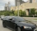 Чорний Міцубісі Lancer, об'ємом двигуна 2 л та пробігом 299 тис. км за 5750 $, фото 1 на Automoto.ua