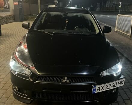 Черный Мицубиси Лансер, объемом двигателя 2 л и пробегом 270 тыс. км за 5600 $, фото 4 на Automoto.ua