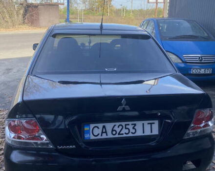 Мицубиси Лансер 2008 в Киеве на Automoto.ua Черный Мицубиси Лансер, объемом двигателя 1.6 л и пробегом 72 тыс. км за 2650 $, фото 2 на Automoto.ua