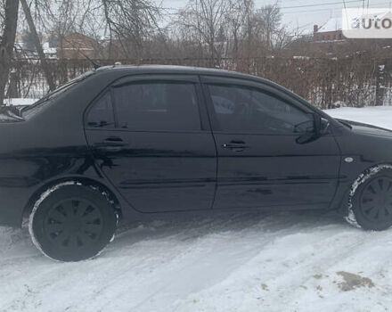 Чорний Міцубісі Lancer, об'ємом двигуна 1.58 л та пробігом 212 тис. км за 4799 $, фото 6 на Automoto.ua