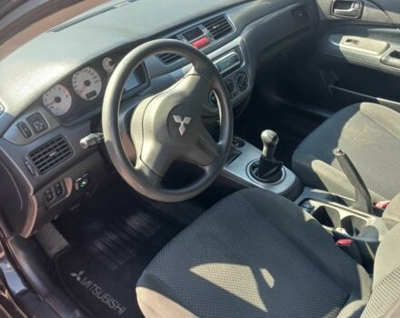 Черный Мицубиси Лансер, объемом двигателя 1.6 л и пробегом 409 тыс. км за 3000 $, фото 5 на Automoto.ua