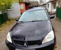 Чорний Міцубісі Lancer, об'ємом двигуна 1.6 л та пробігом 126 тис. км за 4500 $, фото 3 на Automoto.ua