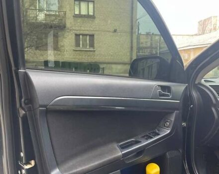 Чорний Міцубісі Lancer, об'ємом двигуна 2 л та пробігом 255 тис. км за 6999 $, фото 7 на Automoto.ua