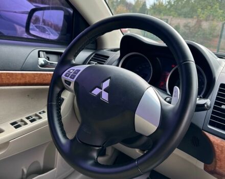 Чорний Міцубісі Lancer, об'ємом двигуна 2 л та пробігом 239 тис. км за 6900 $, фото 11 на Automoto.ua