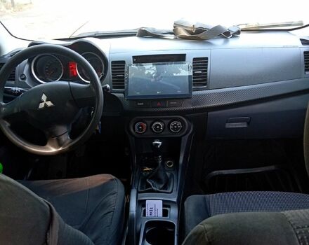 Черный Мицубиси Лансер, объемом двигателя 1.5 л и пробегом 270 тыс. км за 4400 $, фото 7 на Automoto.ua