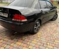 Чорний Міцубісі Lancer, об'ємом двигуна 1.6 л та пробігом 220 тис. км за 3600 $, фото 4 на Automoto.ua