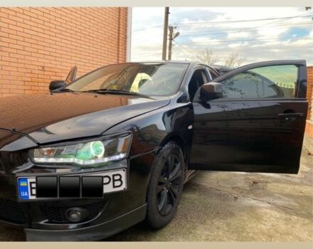 Черный Мицубиси Лансер, объемом двигателя 2 л и пробегом 140 тыс. км за 7200 $, фото 2 на Automoto.ua