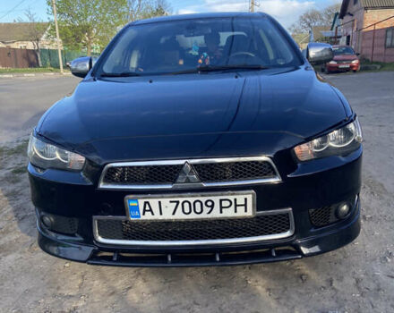 Чорний Міцубісі Lancer, об'ємом двигуна 2 л та пробігом 237 тис. км за 7599 $, фото 6 на Automoto.ua